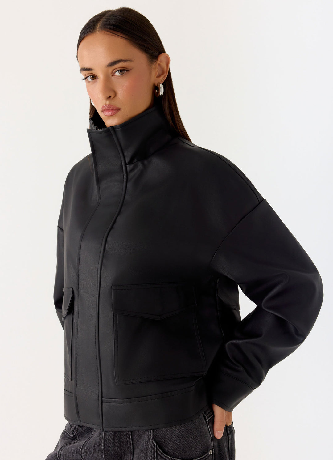 Women's black bomber jacket with mock neck, long sleeves and front flap pockets