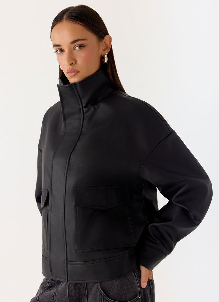 Women's black bomber jacket with mock neck, long sleeves and front flap pockets