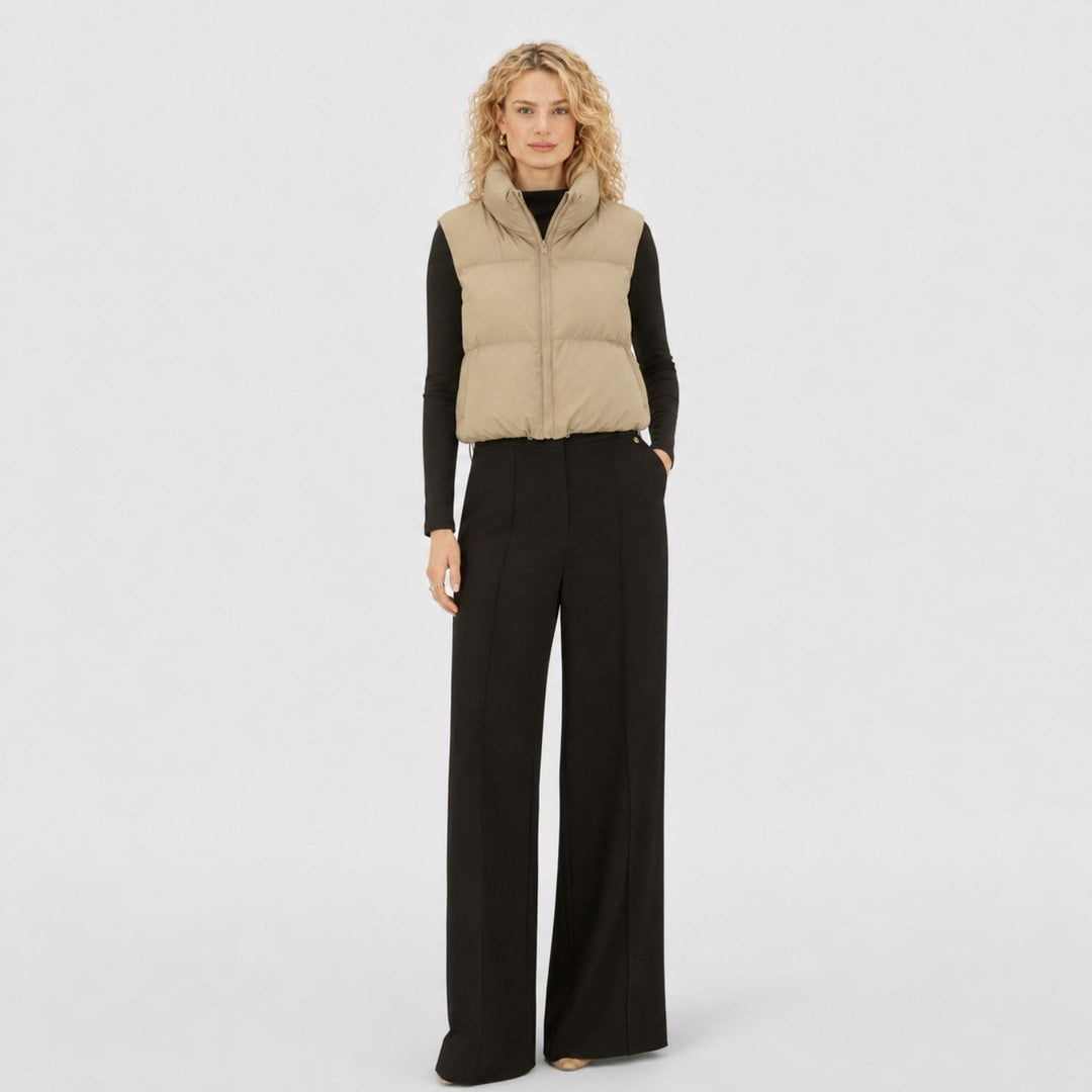 Women's cropped quilted puffer vest with mock neck and zip front