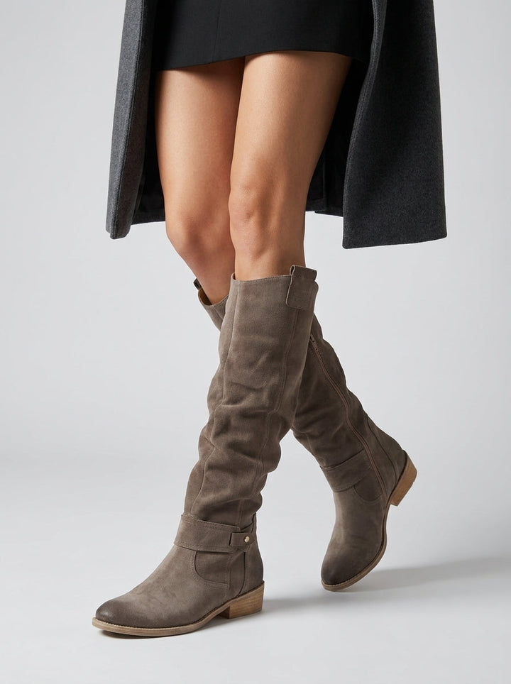 Women's knee-high boots with low block heels, side zippers and decorative straps