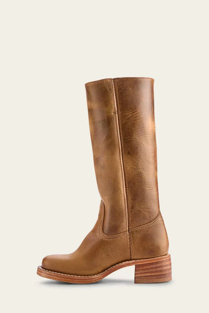 Women's tall knee-high boots with rounded toes, low block heels and stitched shaft detailing