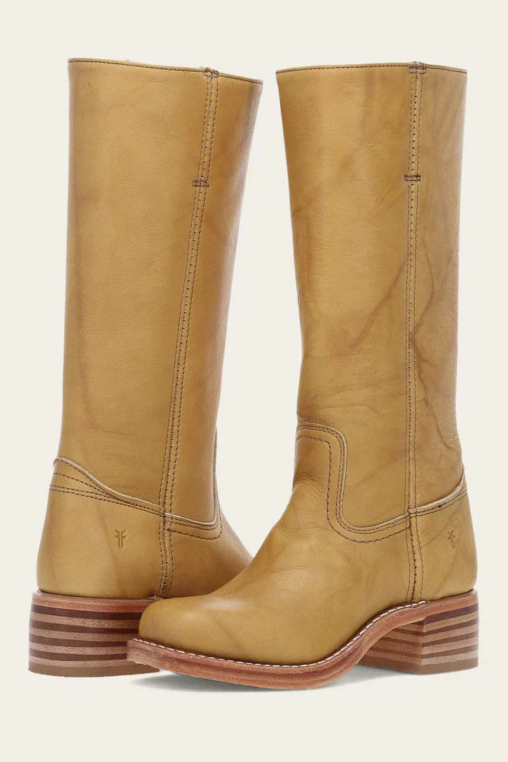 Women's tall knee-high boots with rounded toes, low block heels and stitched shaft detailing