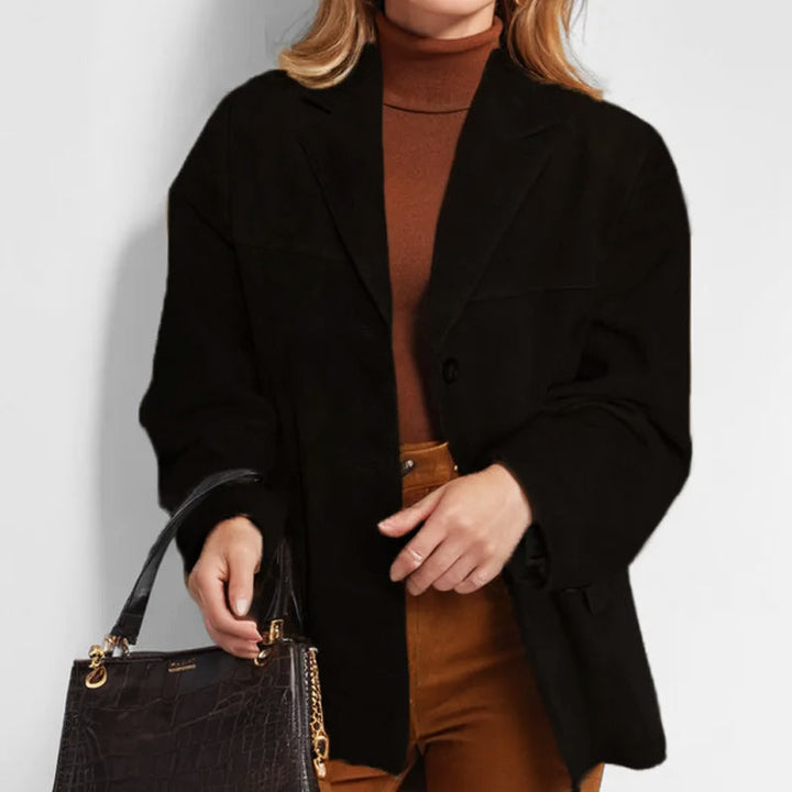 Women's blazer-style jacket with notched lapels, long sleeves and button front