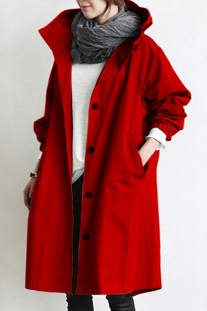 Women's long hooded trench coat with button front, elastic cuffs and side pockets