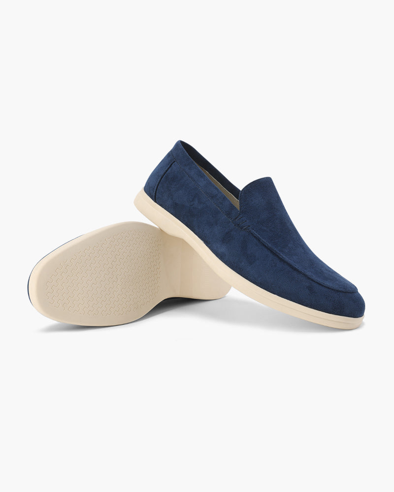 Women's slip-on loafers with moc-toe stitching and a raised wedge sole