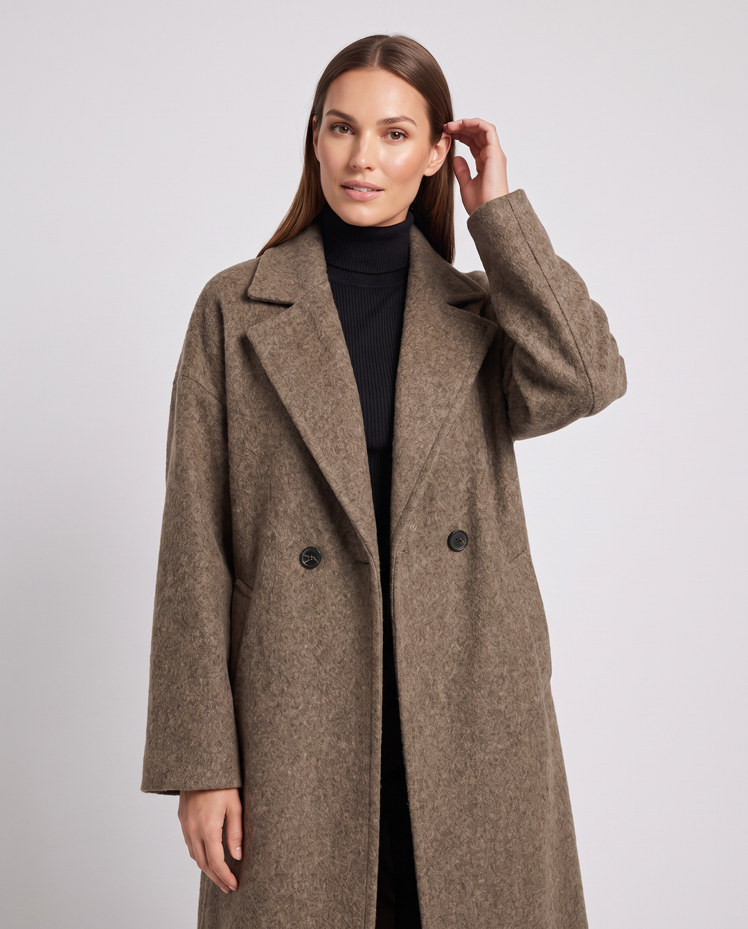 Women's brown longline coat with notched lapels and front pockets