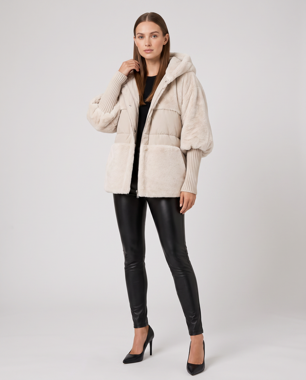 Women's hooded faux fur jacket with quilted panels and front pockets