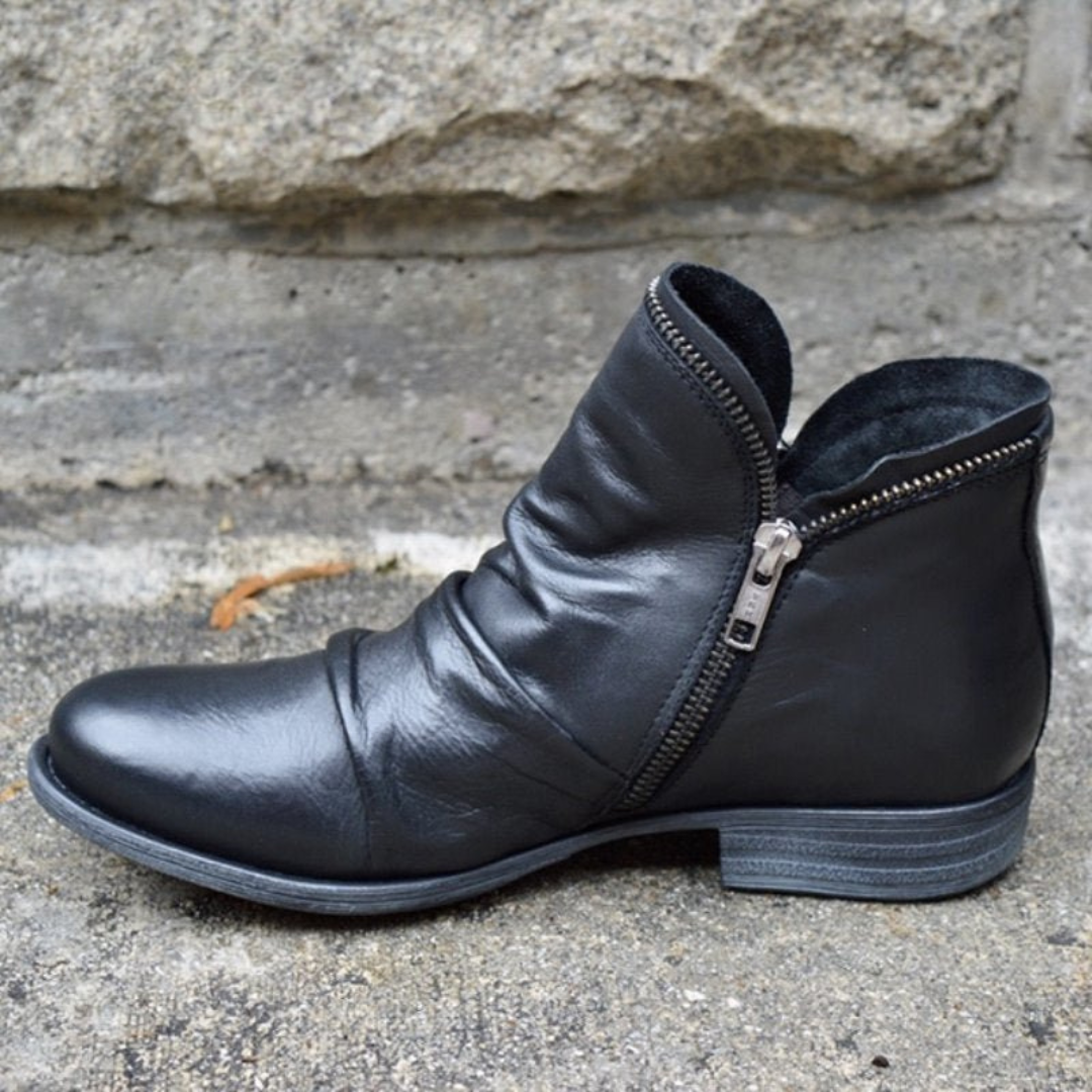 Women's wide fit ankle boot with side zipper, ruched upper and low heel