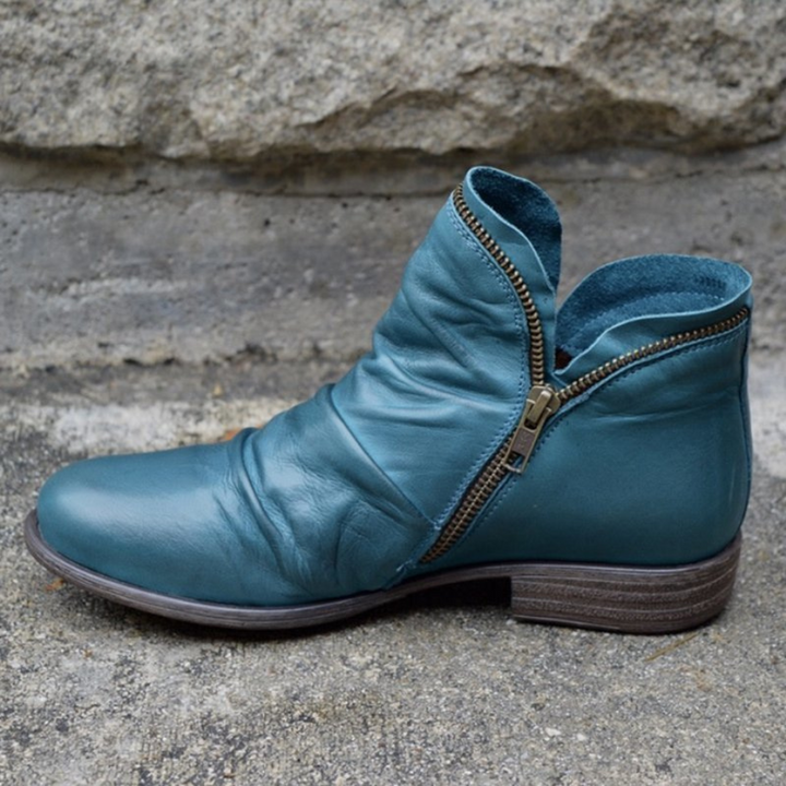 Women's wide fit ankle boot with side zipper, ruched upper and low heel
