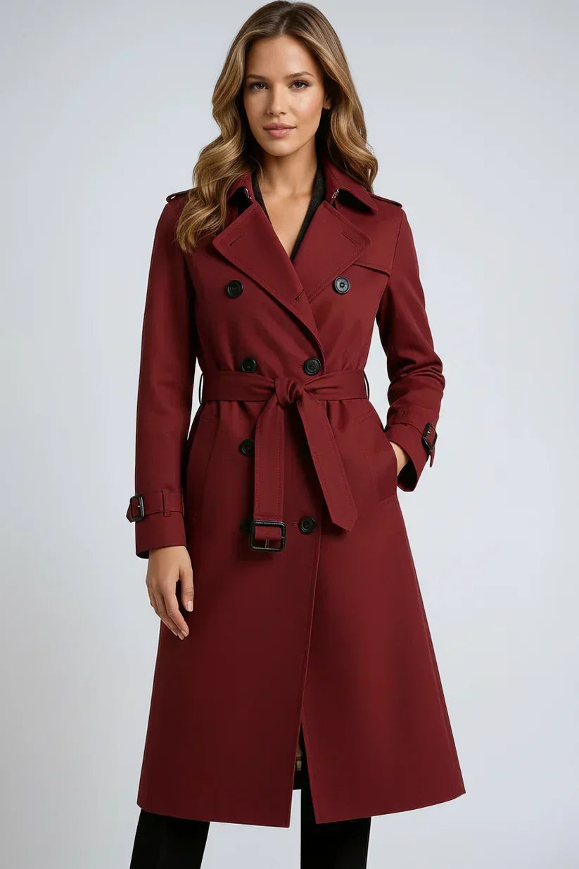 Women's long belted double-breasted trench coat with lapels and cuff straps