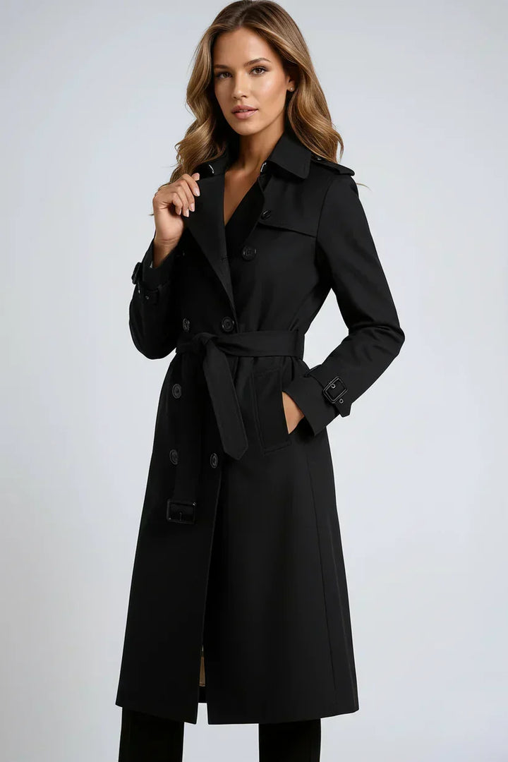 Women's long belted double-breasted trench coat with lapels and cuff straps