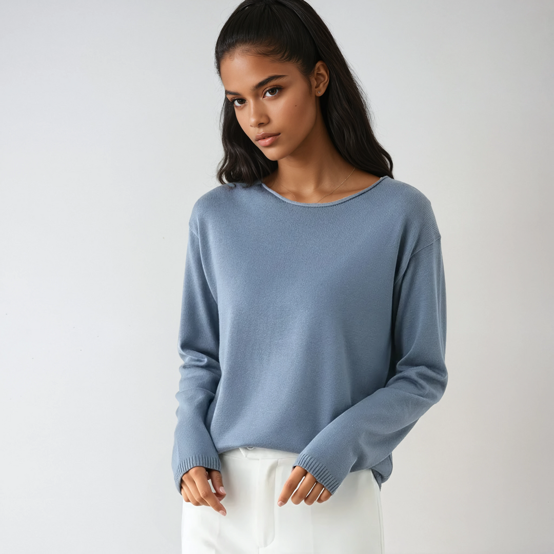 Women's fine knit crew neck sweater with long sleeves and ribbed trims