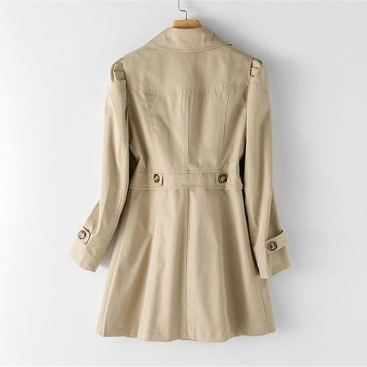 Women's tailored trench coat with notched lapels, long sleeves and buttoned cuffs