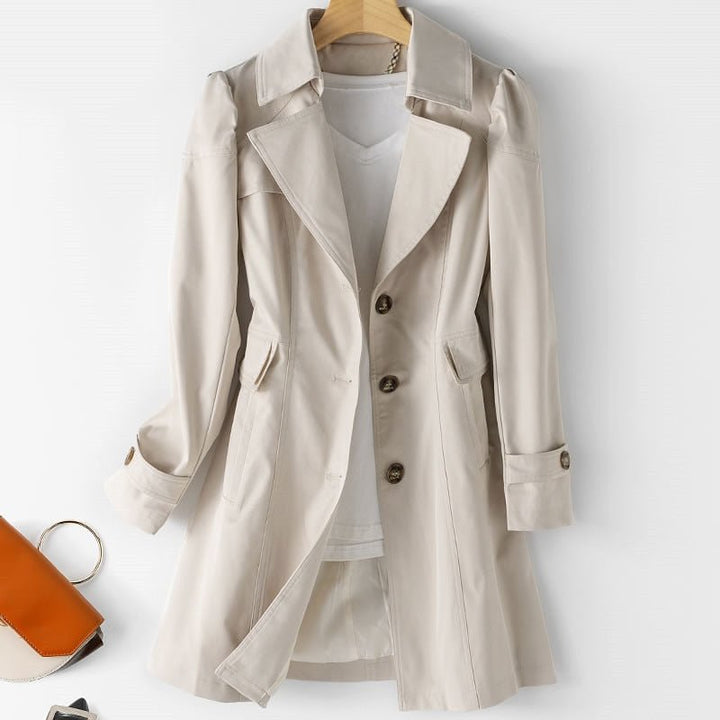 Women's tailored trench coat with notched lapels, long sleeves and buttoned cuffs