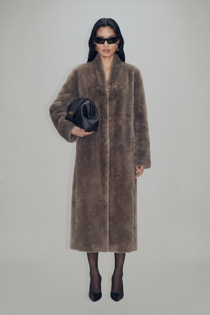 Women's brown textured long coat with long sleeves and mid-calf length