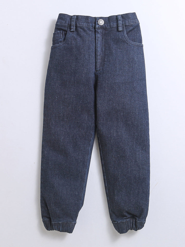 Gray hooded top with striped sleeves and dark joggers