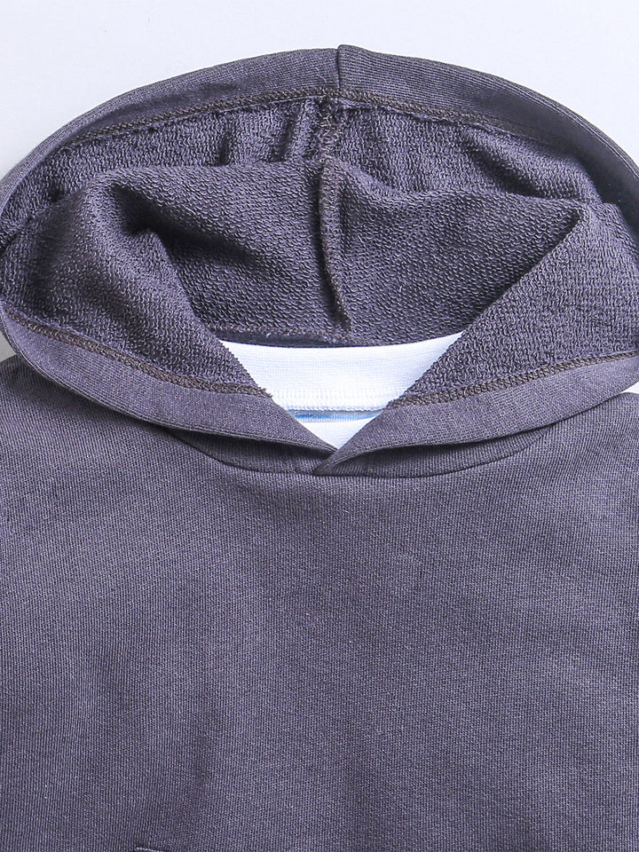 Gray hooded top with striped sleeves and dark joggers