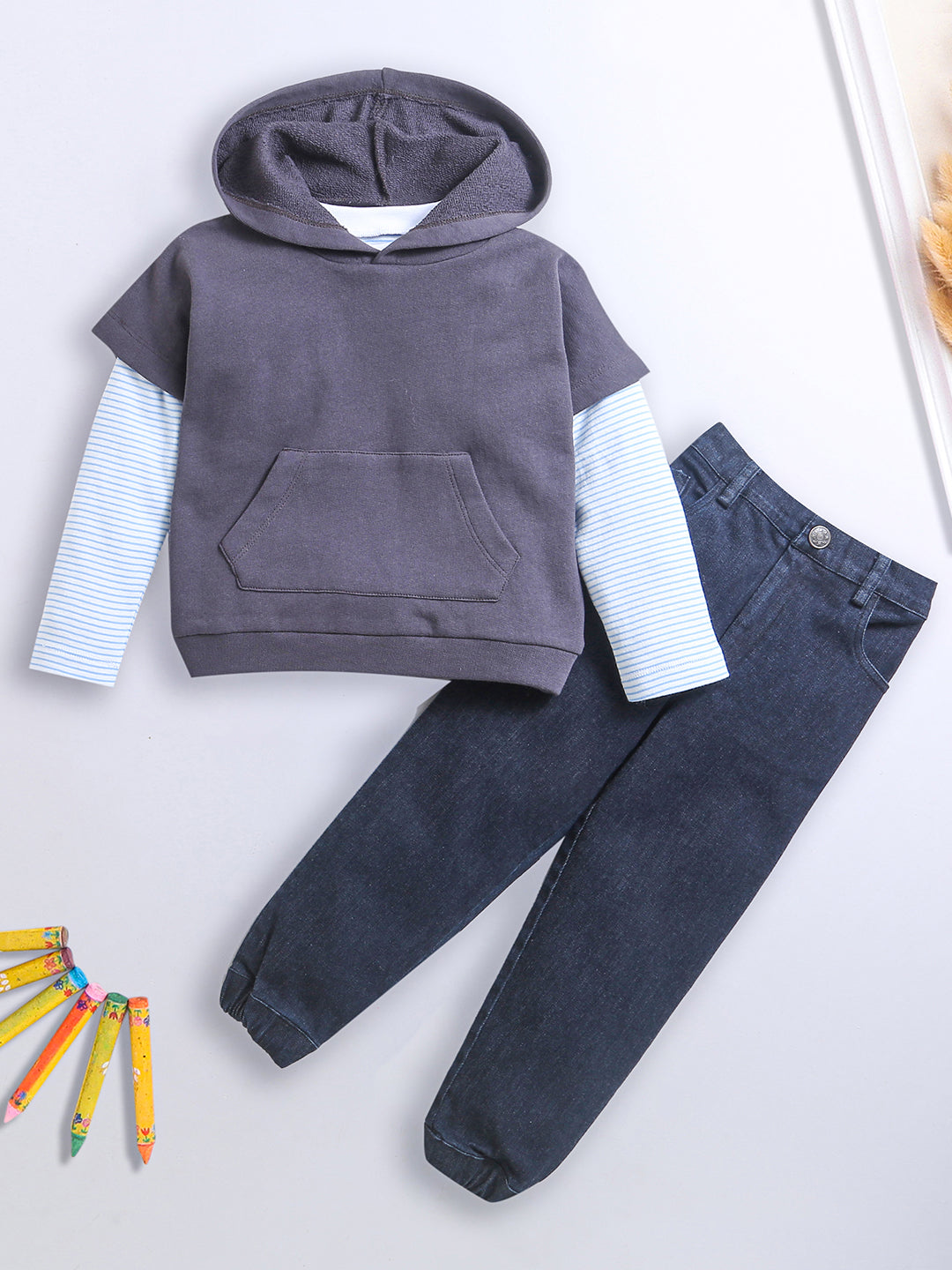 Gray hooded top with striped sleeves and dark joggers