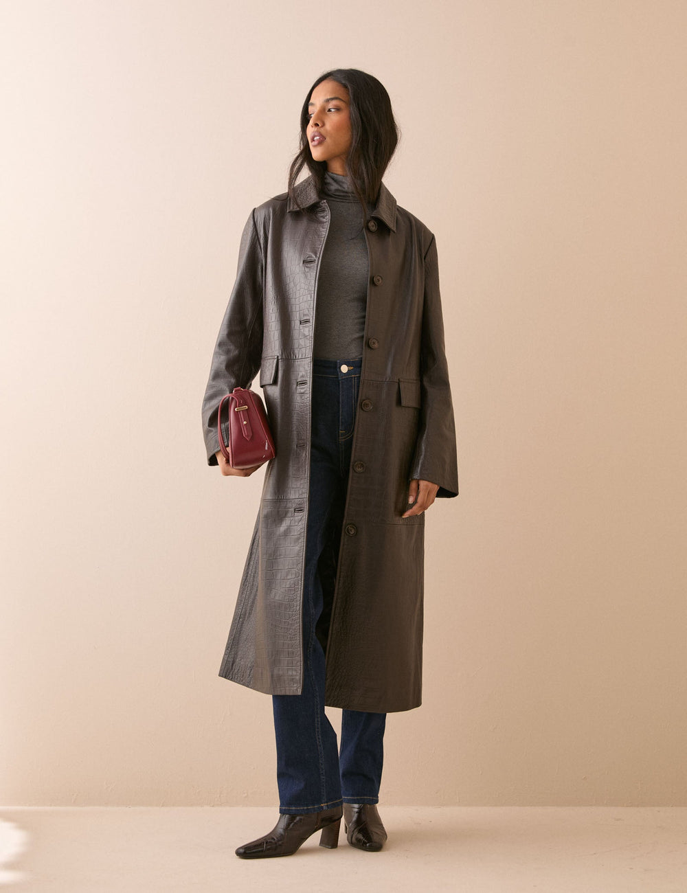 Women's dark brown croc-embossed long coat with collar and button front