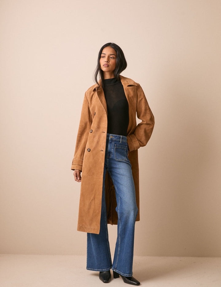 Women's brown belted trench coat with notched collar and long sleeves