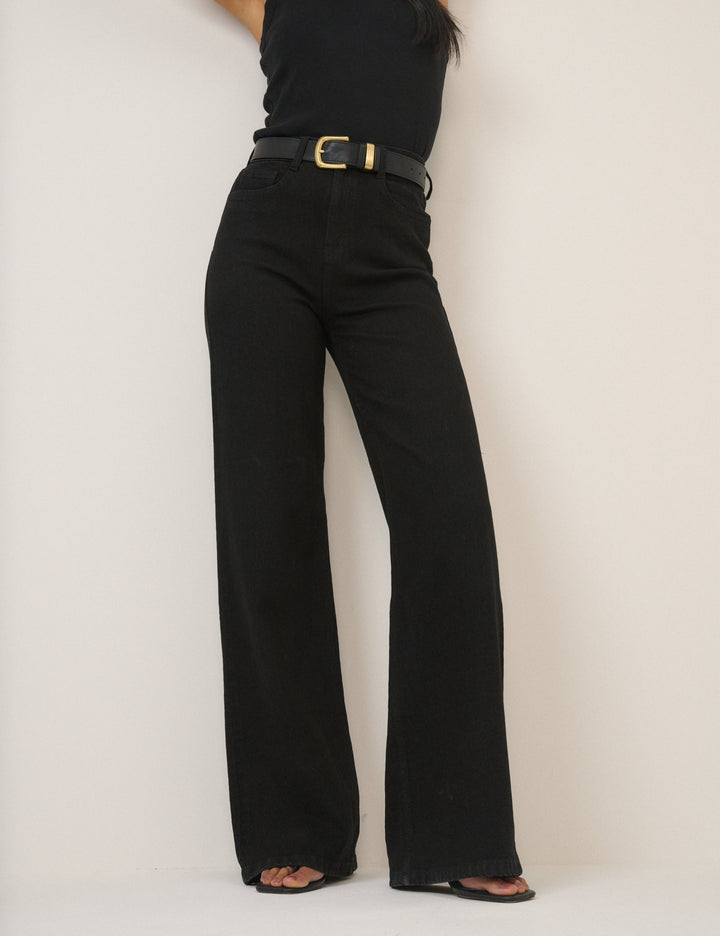 Women's black high-rise wide-leg jeans with full-length hems