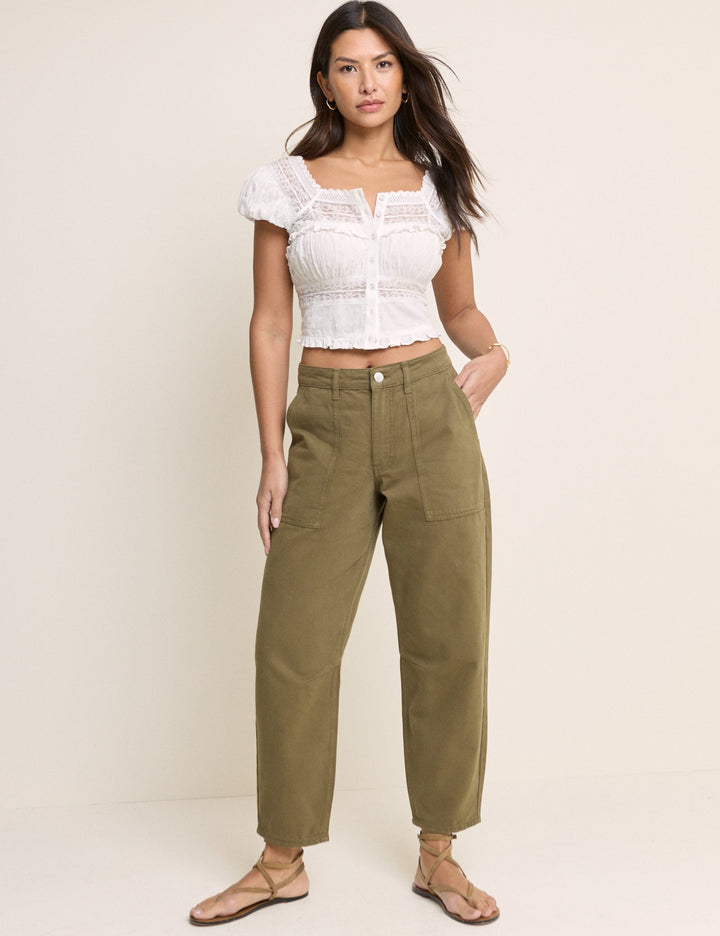 Women's khaki cropped utility trousers with straight legs and patch pockets