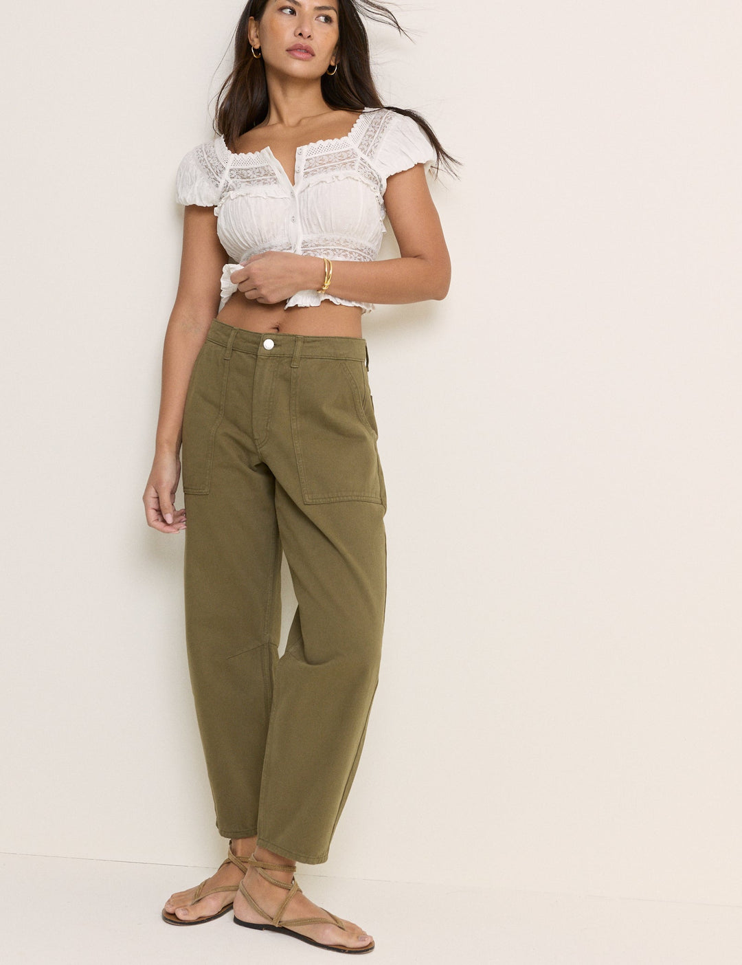 Women's khaki cropped utility trousers with straight legs and patch pockets