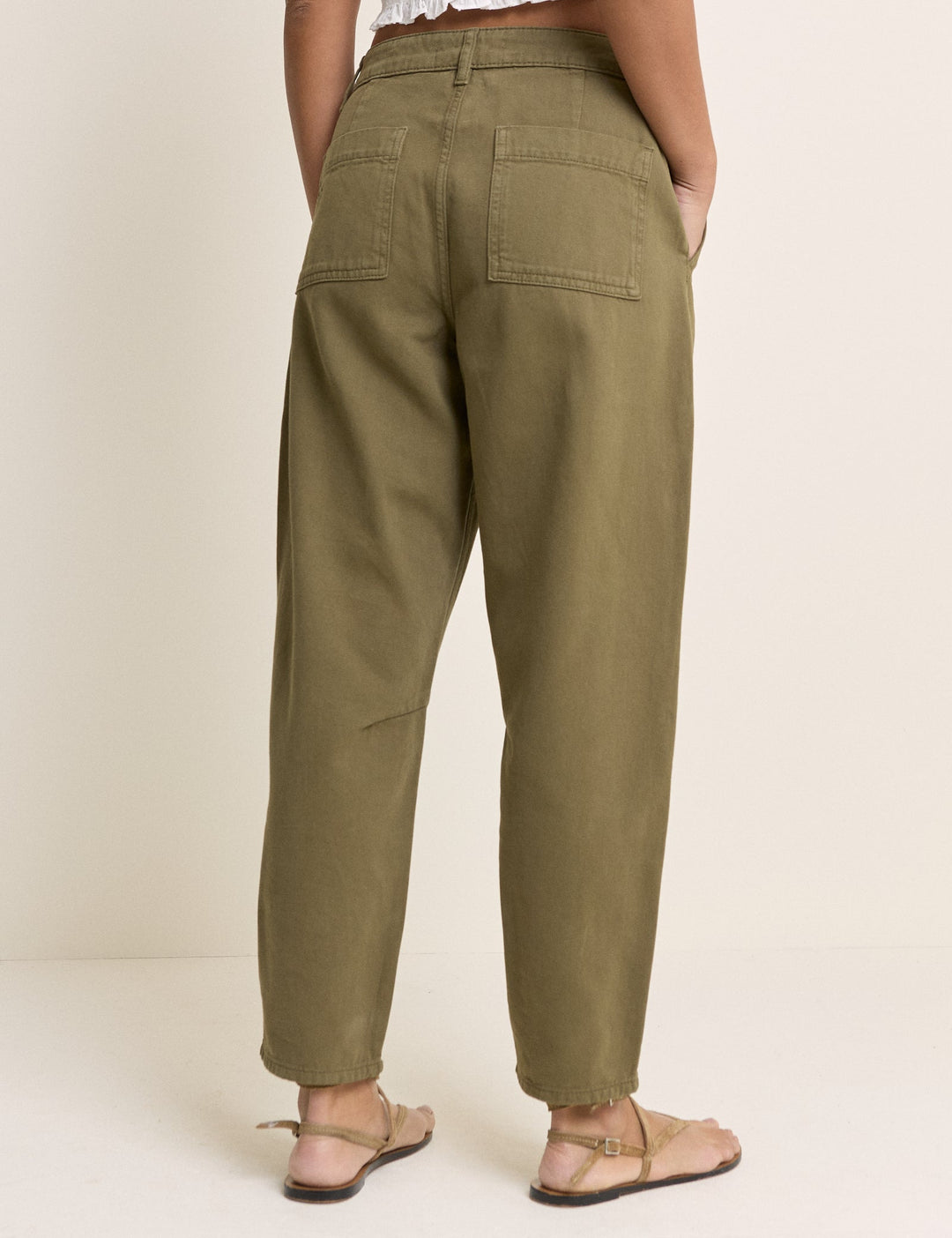 Women's khaki cropped utility trousers with straight legs and patch pockets