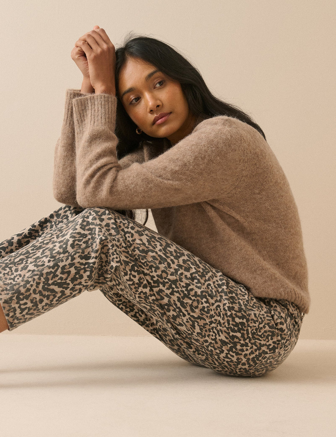 Women's beige leopard print mid-rise tapered jeans with cropped ankle-length legs