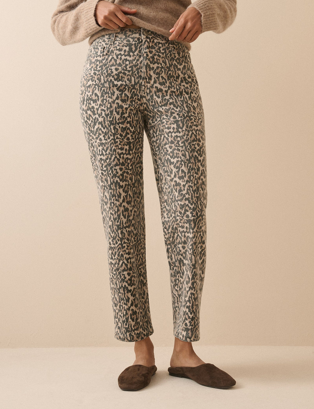 Women's beige leopard print mid-rise tapered jeans with cropped ankle-length legs