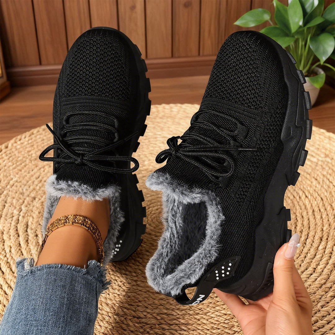 Fleece-lined lace-up sneakers with textured uppers and rugged soles