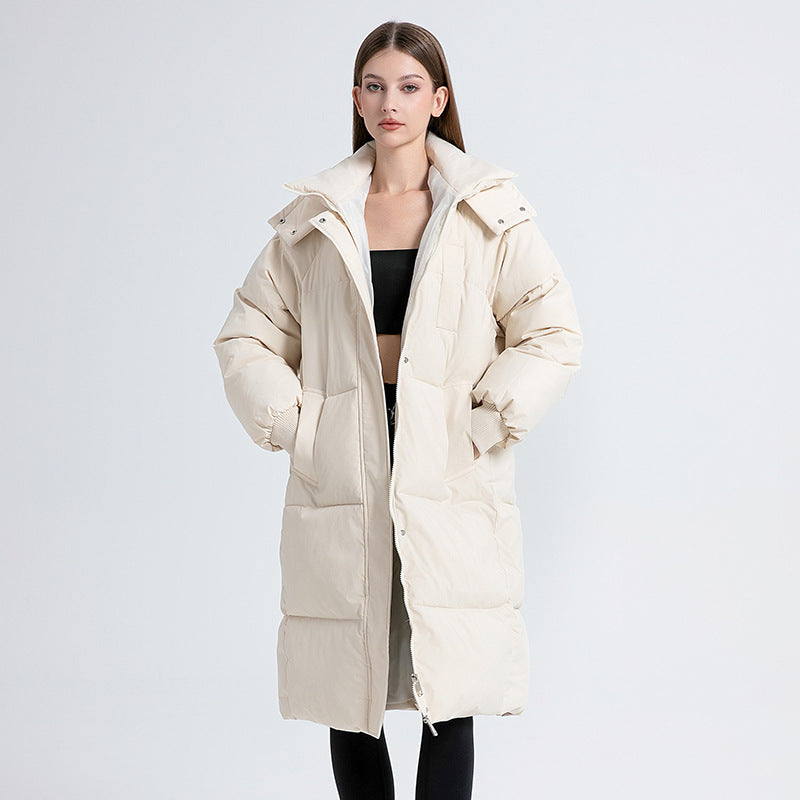 Women's long quilted puffer coat with hood, zipper front and patch pockets