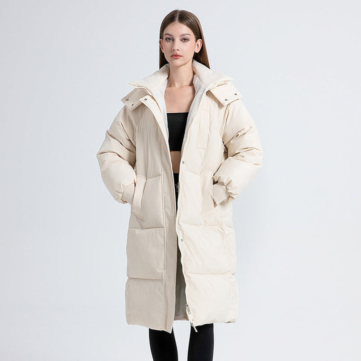 Women's long quilted puffer coat with hood, zipper front and patch pockets