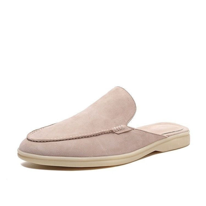 Backless women's mule loafer with rounded toe and low heel