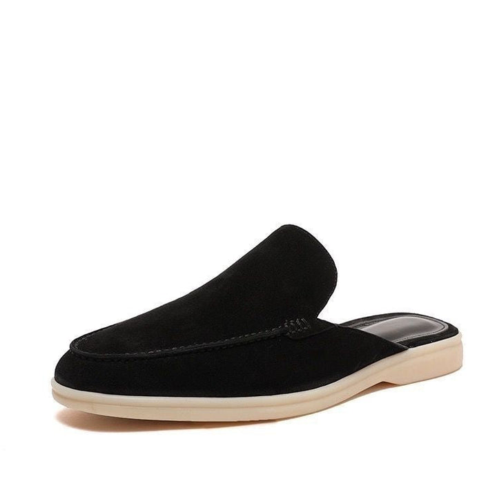 Backless women's mule loafer with rounded toe and low heel