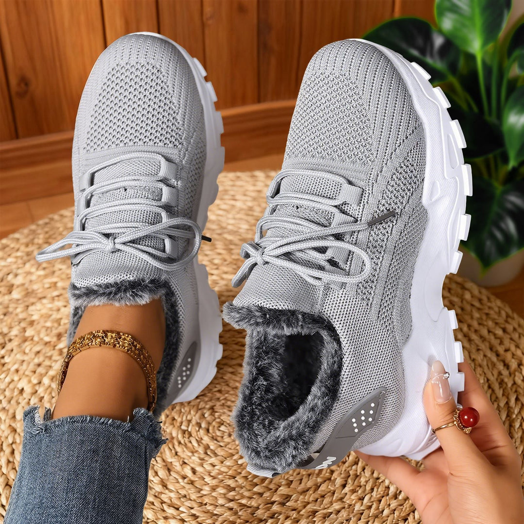Fleece-lined lace-up sneakers with textured uppers and rugged soles