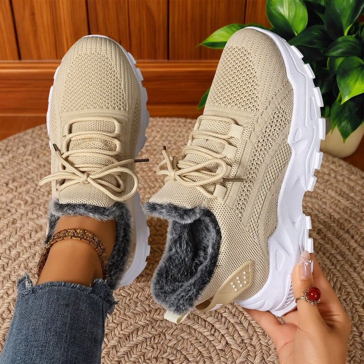 Fleece-lined lace-up sneakers with textured uppers and rugged soles