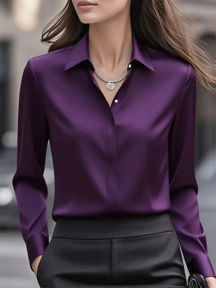 Women's long-sleeve button-front blouse with pointed collar