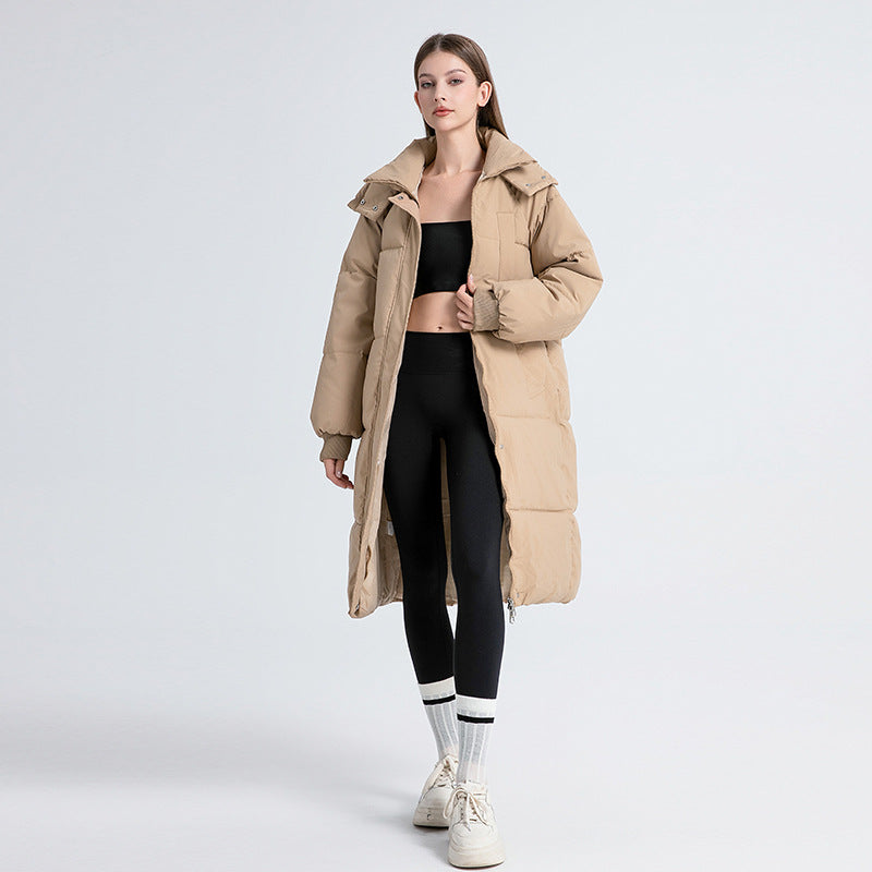 Women's long quilted puffer coat with hood, zipper front and patch pockets