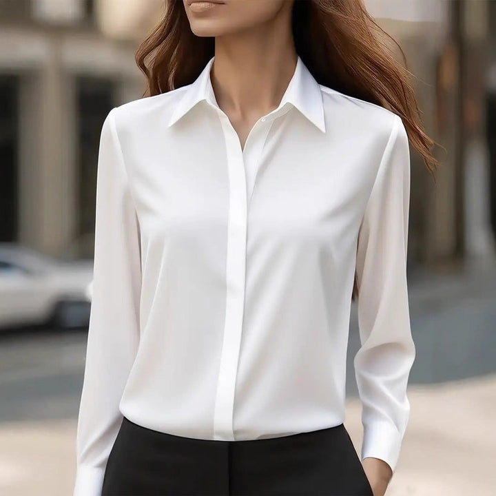 Women's long-sleeve button-front blouse with pointed collar