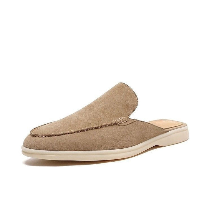 Backless women's mule loafer with rounded toe and low heel