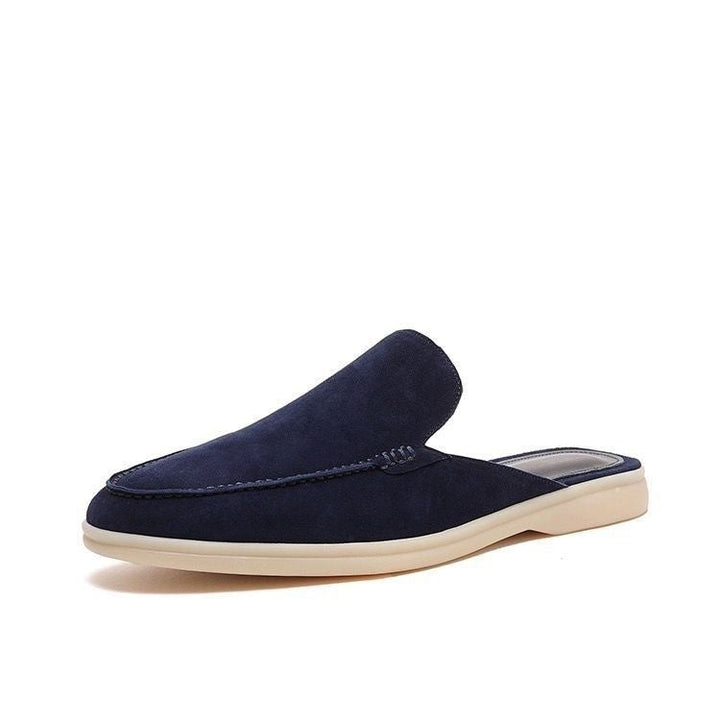 Backless women's mule loafer with rounded toe and low heel
