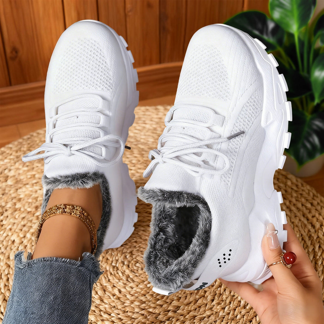 Fleece-lined lace-up sneakers with textured uppers and rugged soles