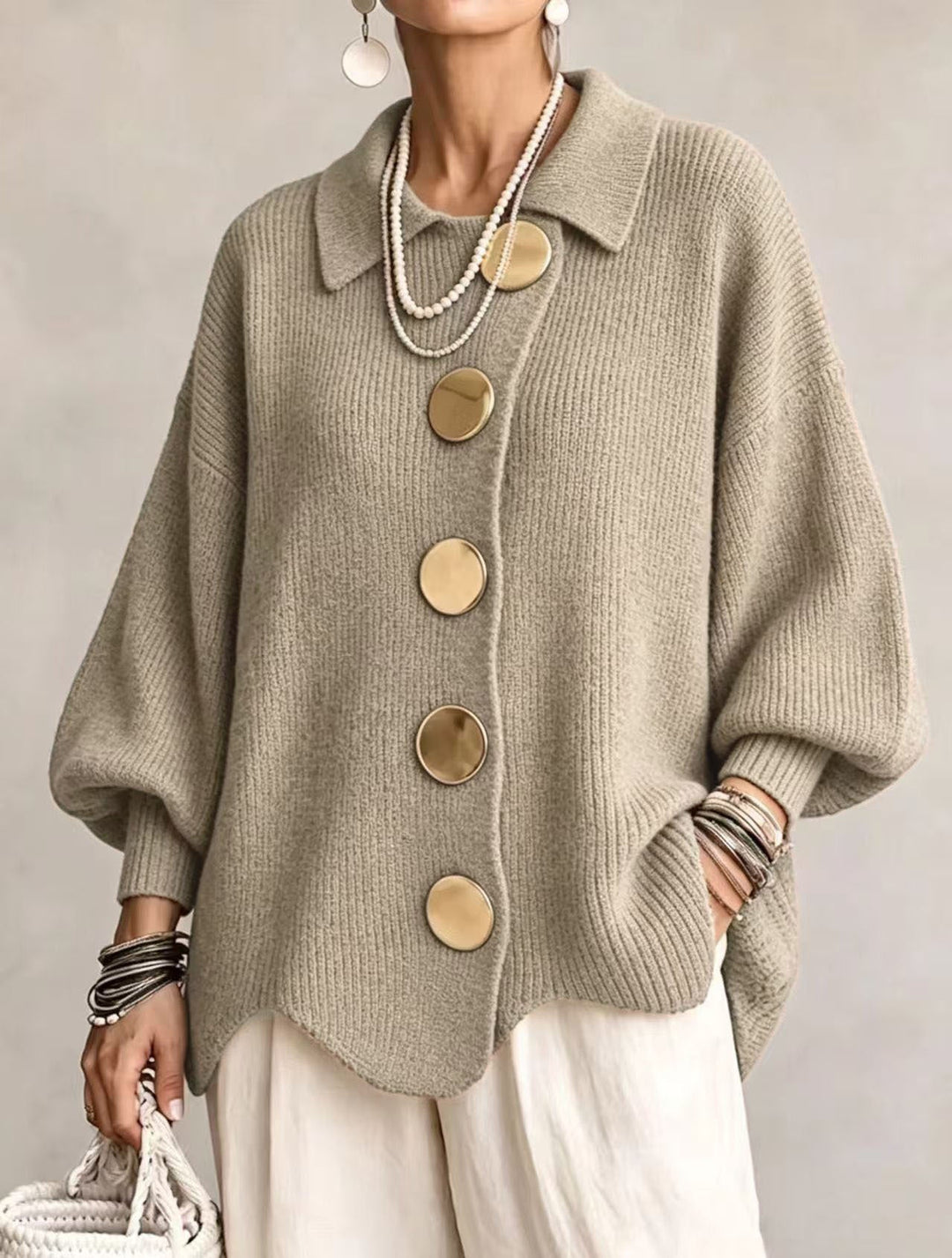 Women's oversized ribbed knit cardigan with pointed collar and large buttons