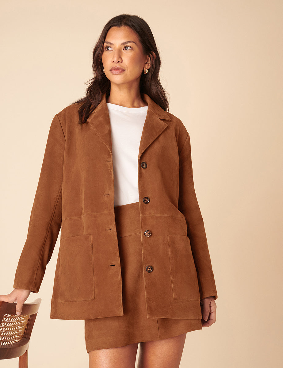 Women's brown blazer jacket with notched lapels, buttons and patch pockets