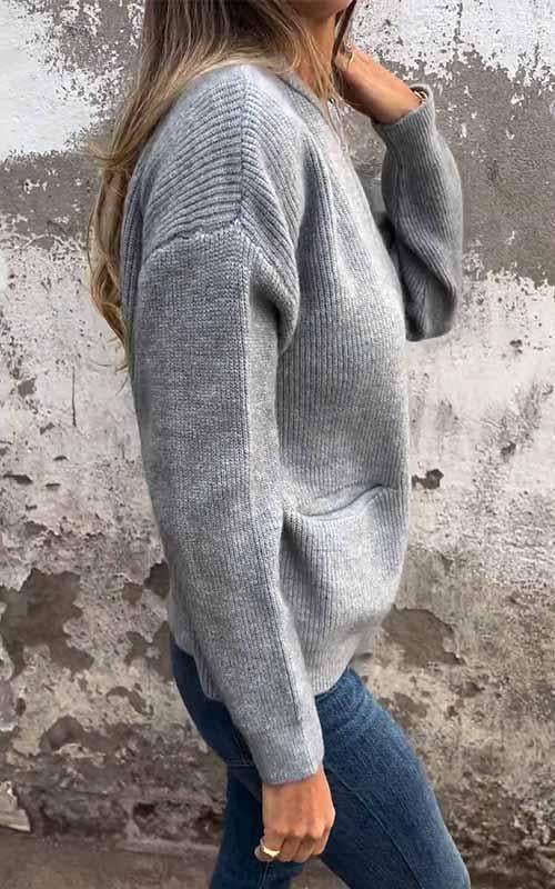 Women's ribbed knit jacket with stand collar, front zipper and patch pockets