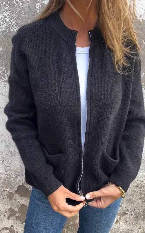 Women's ribbed knit jacket with stand collar, front zipper and patch pockets