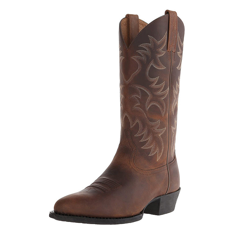 Tall embroidered cowboy boots with pointed toes and low western heels