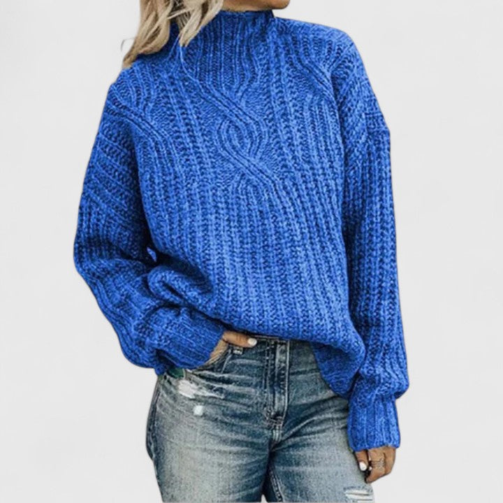 Women's cable knit sweater with high mock neck and long sleeves