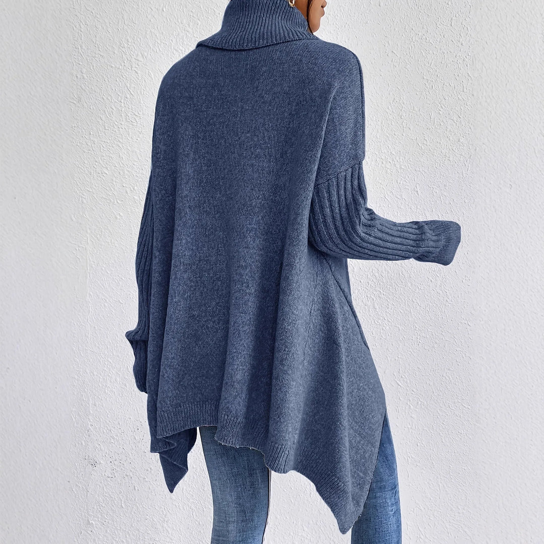 Women's oversized turtleneck sweater with asymmetric hem and side splits